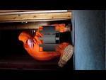Putting On 2 Oversized Orange Boilersuits with hi vis strips