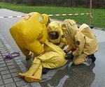 Guys in Level A Hazmat Suits