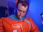 Guys in Air Fed Nuclear Suits